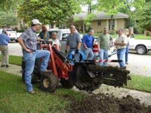 the Danville Irrigation Repair Team with their trusty trencher